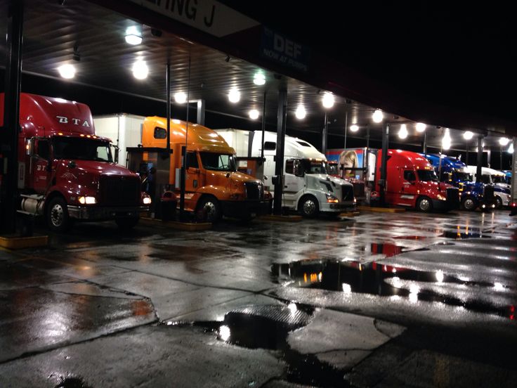 Forklift loading cargo at warehouse